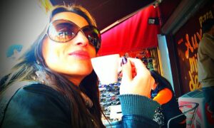 Me drinking coffee in Paris